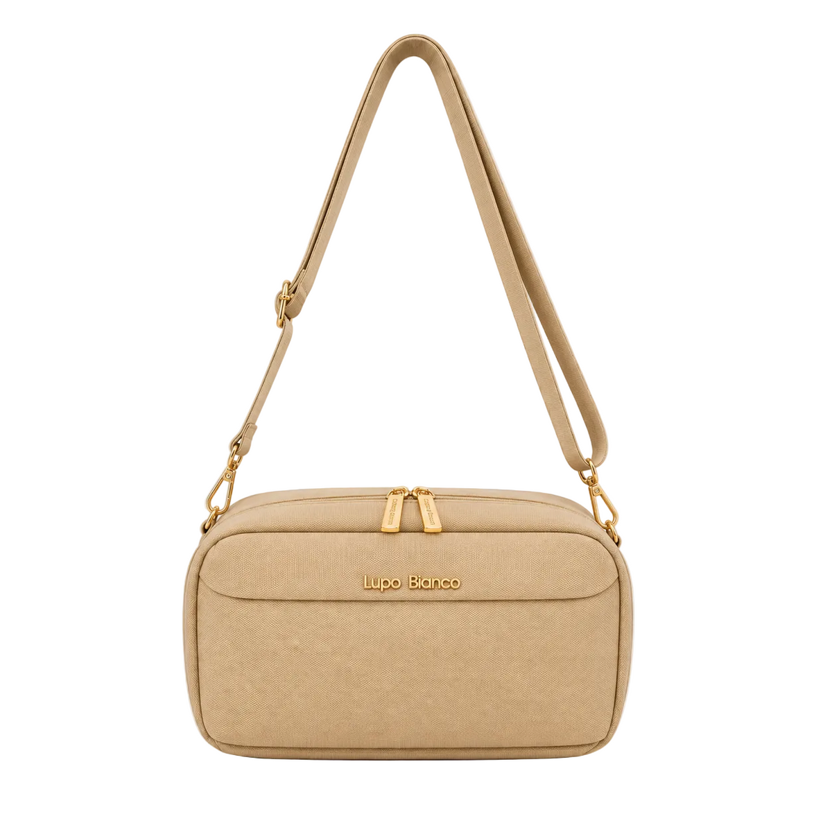 A beige canvas crossbody bag with a gold-tone logo on the front and gold hardware, shown against a plain light gray background.